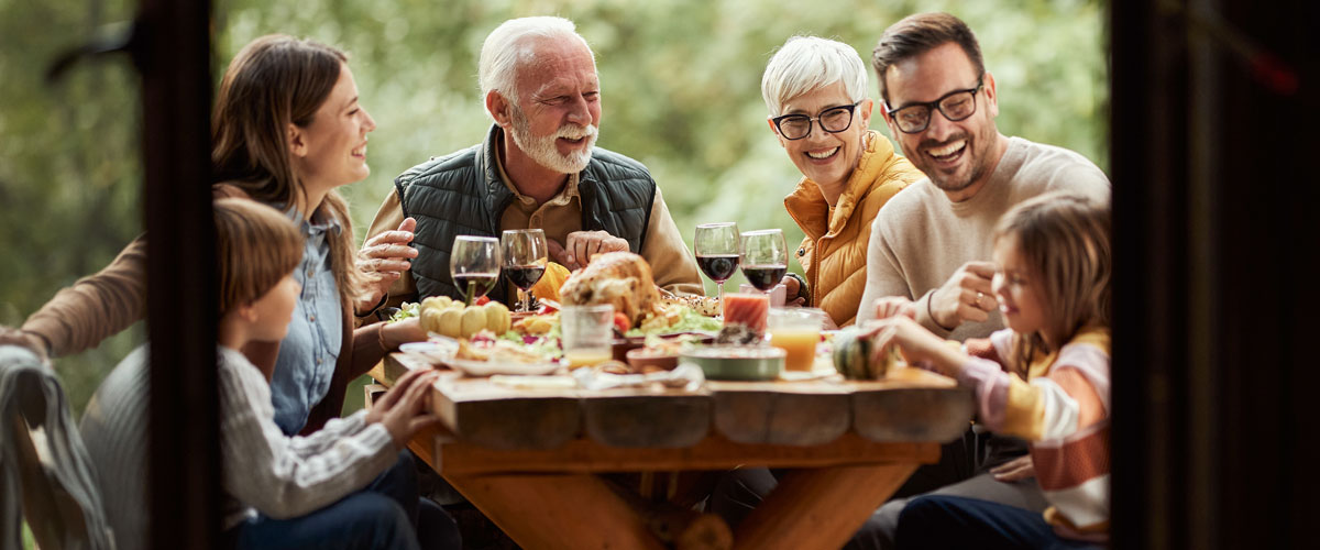 Happy family enjoying a meal together at a table