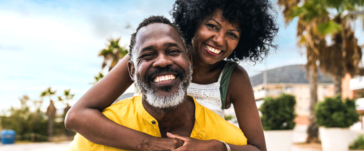 A couple exploring their tropical vacation destination.